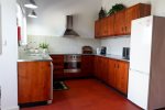 Fully equipped kitchen with family size appliances, fridge, stove, dish washer